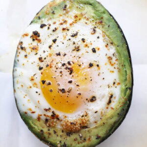 Baked egg with avocado and pepper.