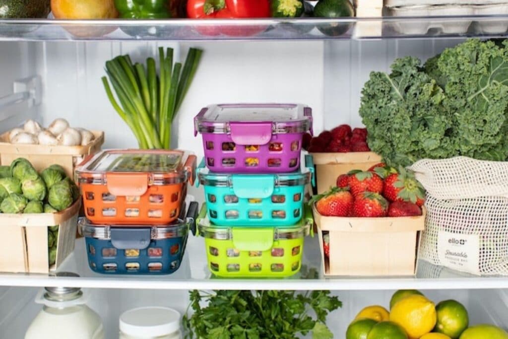 Inside of fridge stocked with fresh foods.