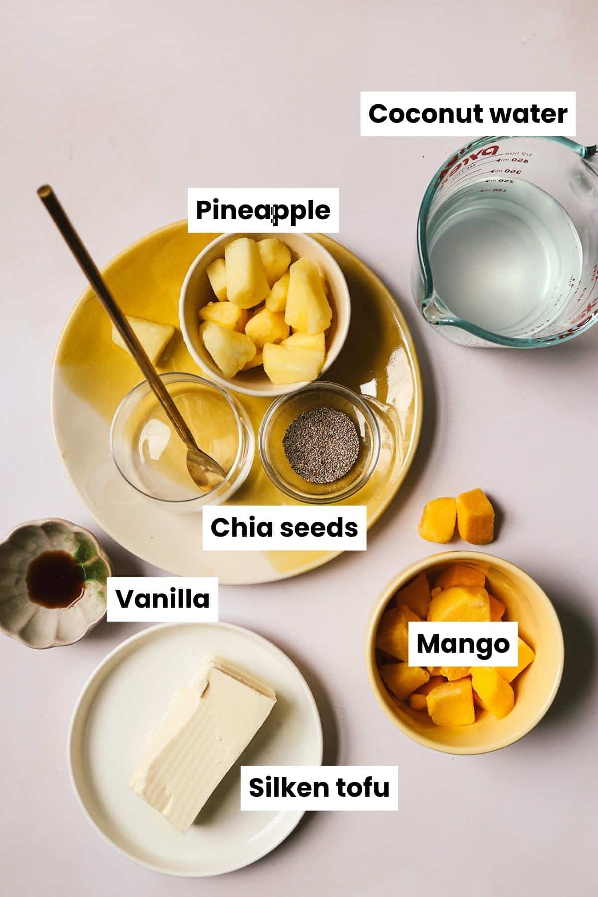 Overheat ingredient image with the following ingredients: pineapple, mango, coconut water, vanilla, chia seeds, silken tofu.